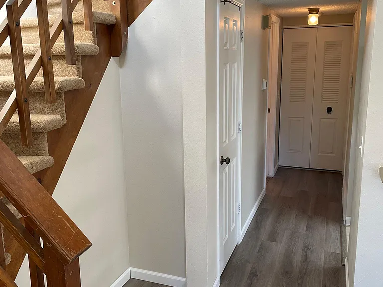 Hallway to the pantry bathroom and downstairs bedroom