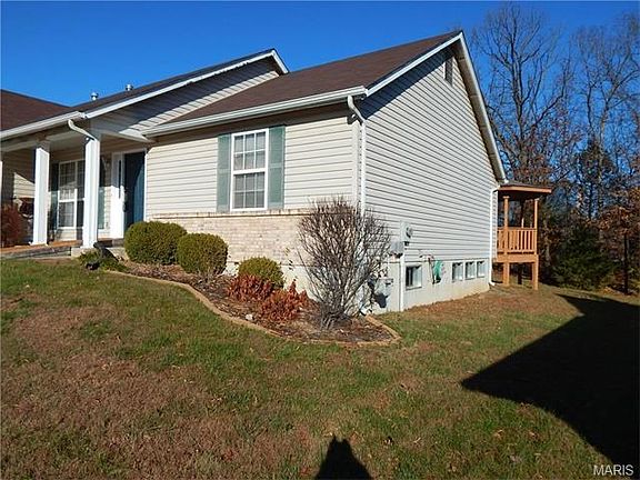 Side view towards back of home.