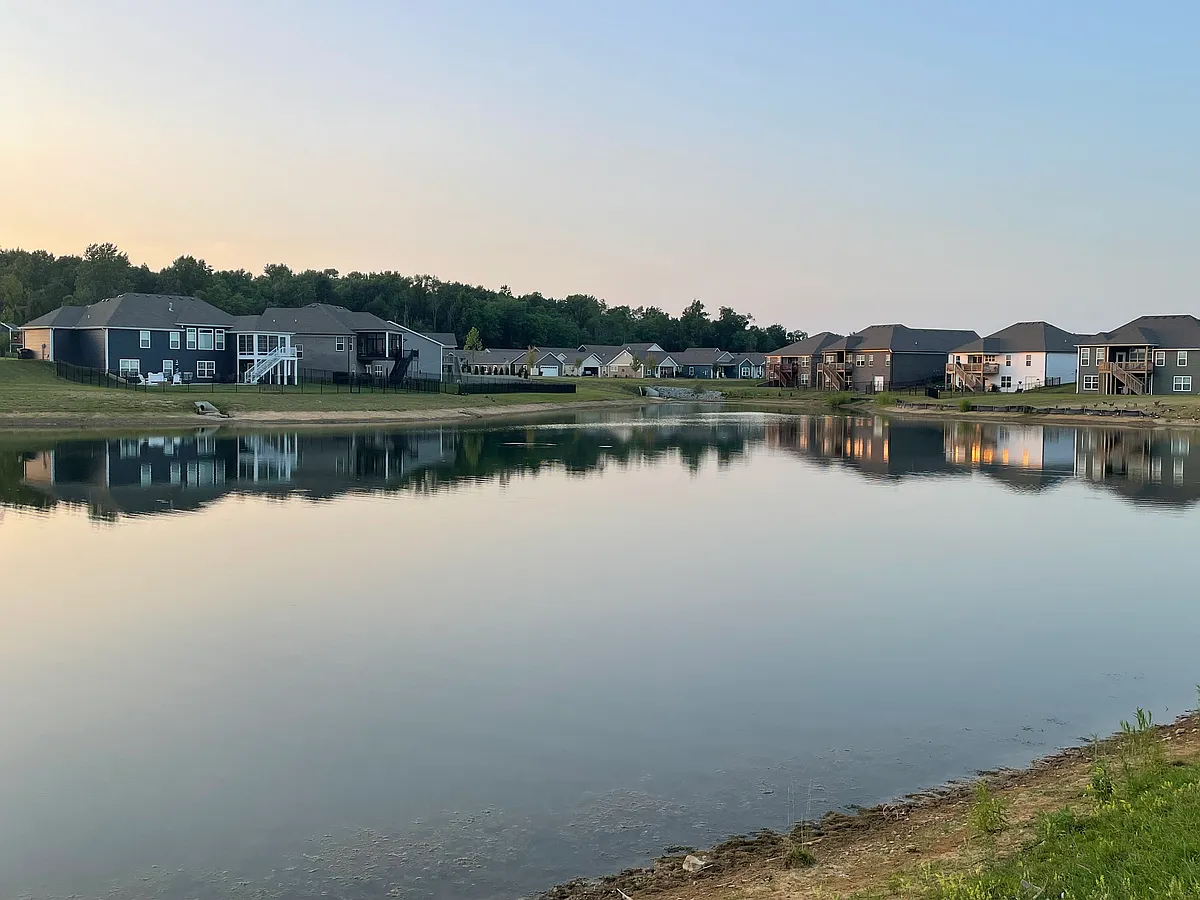 Walking trail view of first lake. House 100 yards from opposite side of the water and 1 block from community pool and clubhouse. - 3904 Lotus Loop