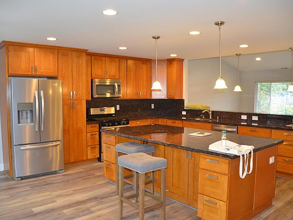 Looking S. toward front yard, through first level greatroom.