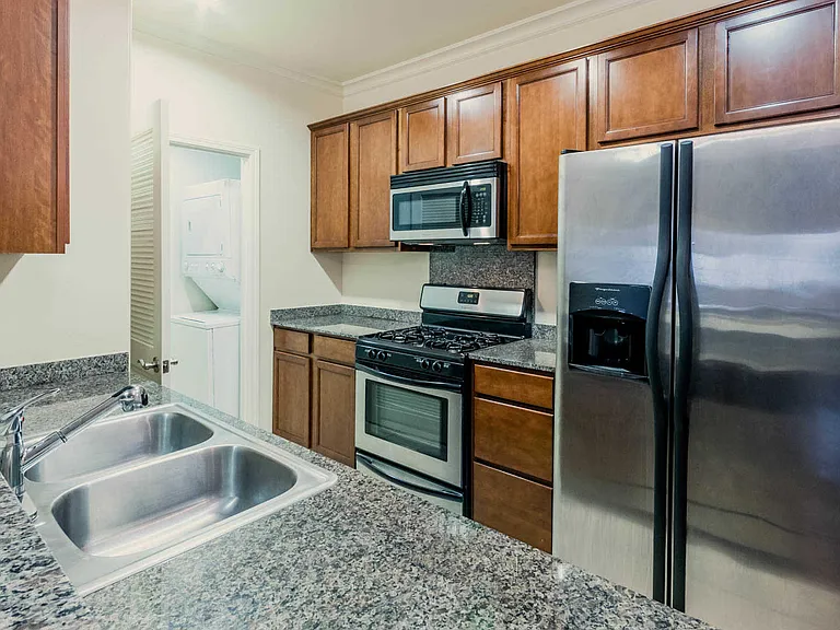 Kitchen with Granite Countertops and Stainless Steel Appliances