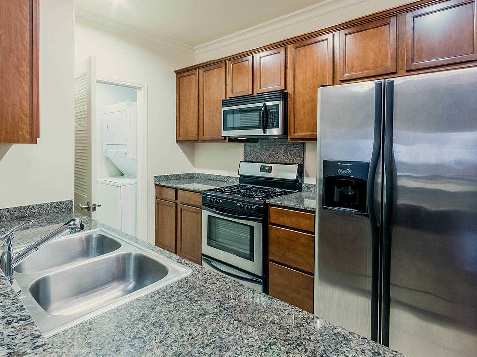 Kitchen with Granite Countertops and Stainless Steel Appliances