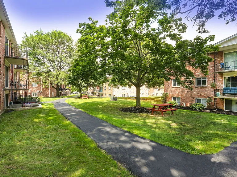 Village Center Apartments — Photo 1