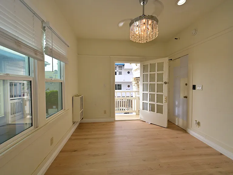 FULLY UPGRADED Studio + private balcony with Ocean view, New flooring, almost new everything, with in-unit laundry!