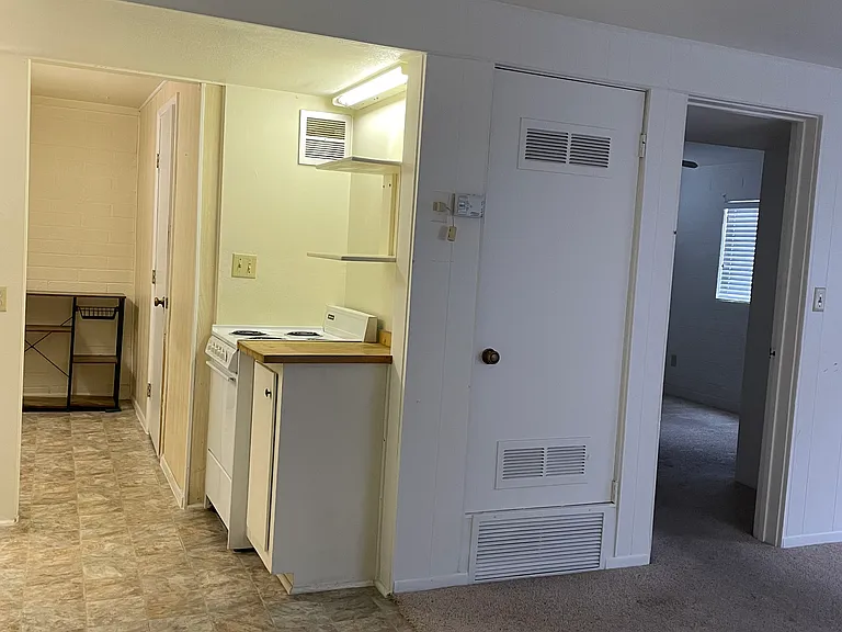 kitchen living bedroom through the door