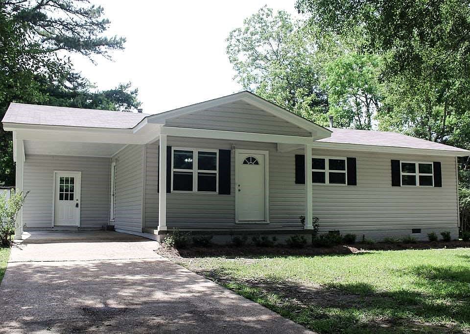 Street view of the front of this lovely home