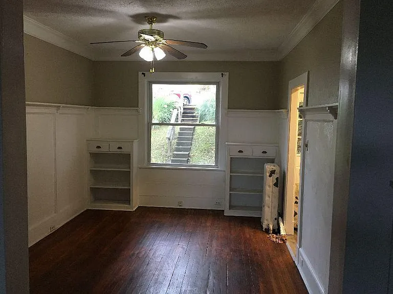 Living Room with built in storeage cabinets