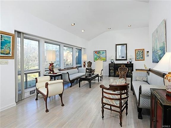 Bright and airy Living Room with high ceilings.