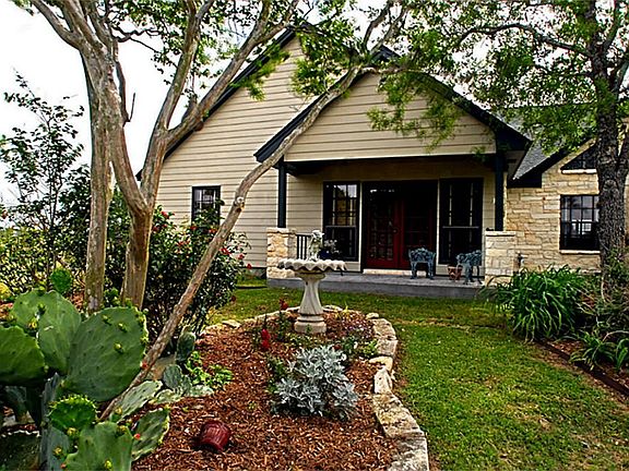 Enjoy 30+/- SPRAWLING acres with a nice custom home located off the main road allowing for a private setting and constant country breezes throughout the day.