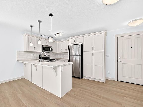 4th image of 450 W Sage Valley Dr NW #2105