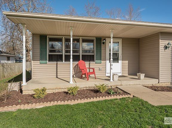 The covered porch is a great place to sit and watch the kiddos play.