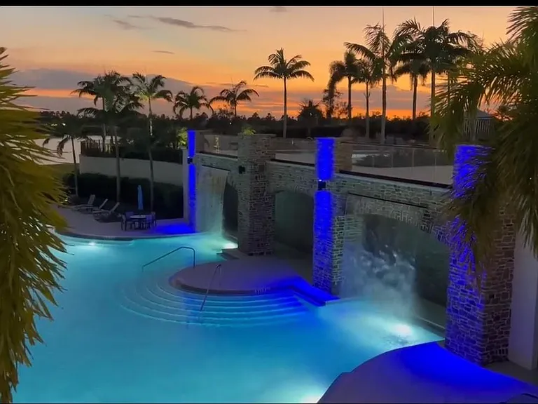 RESORT POOL WITH WATERFALLS
