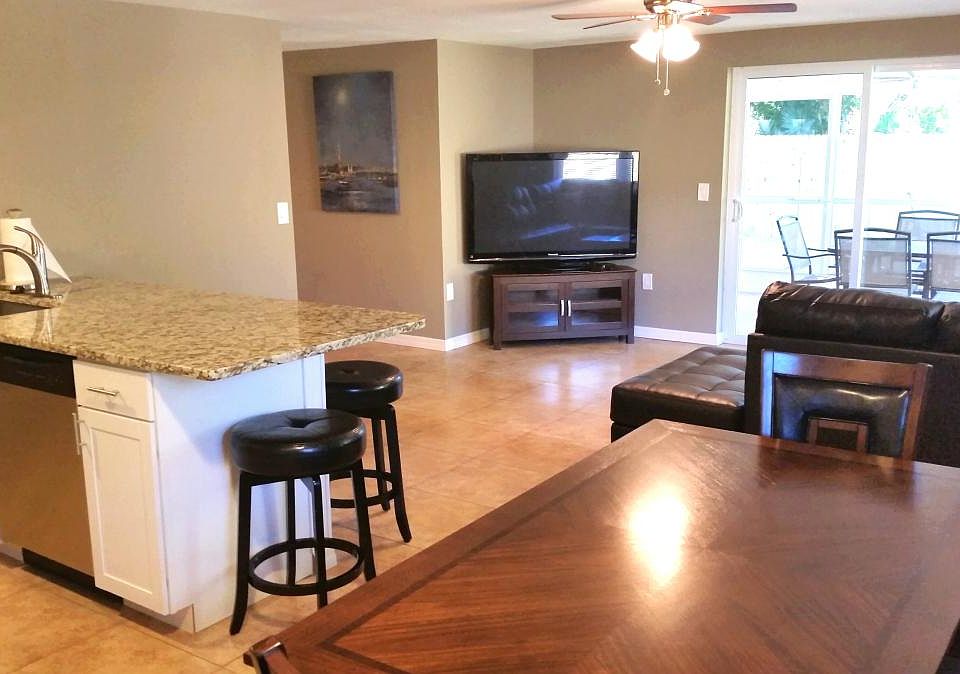 Open concept kitchen/dining room/living room