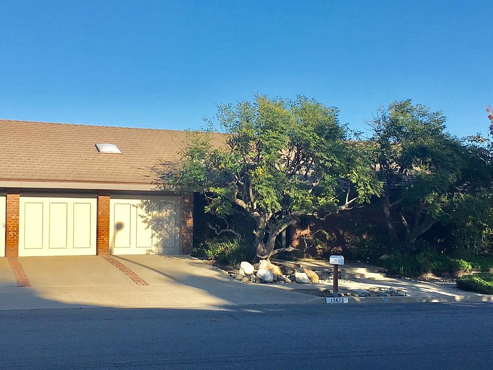 Front of home with 3-car garage