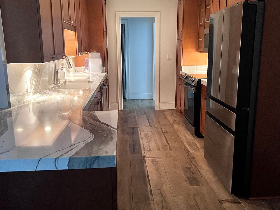 Lights under the cabinets provide this space soft lighting.