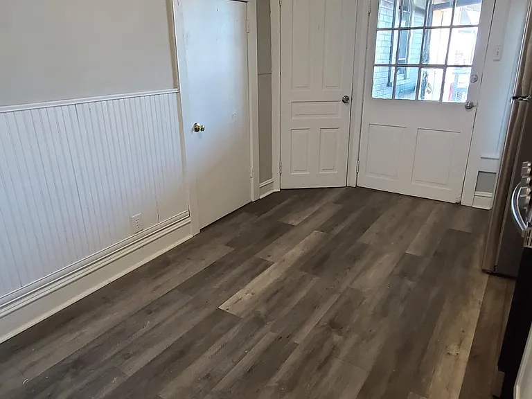 Spacious kitchen with new cabinets & granite counter and stainless steel appliances