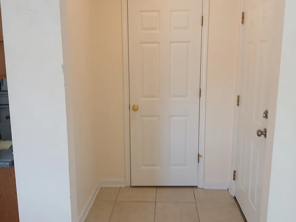 Front entrance and closet.