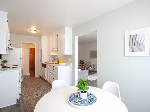 DIning area into kitchen and living room