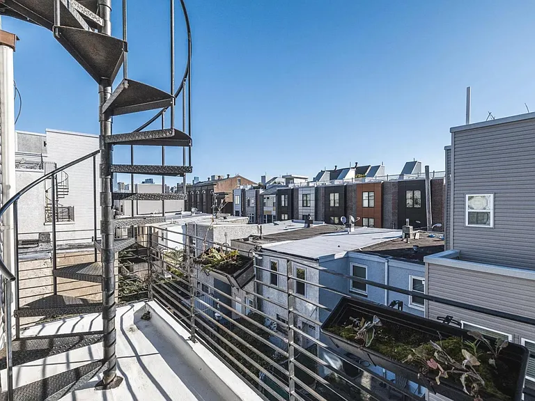 balcony with roof deck access