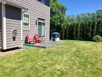 Spacious yard with deck, and a natural gas barbeque hook-up.
