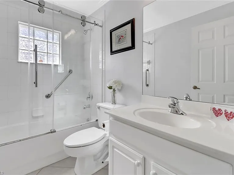 7477 Lourdes Ct — Photo 14