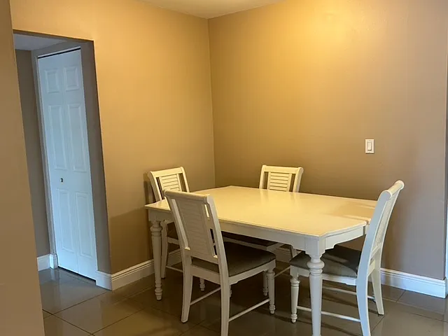 furnished new white dining room table and chairs