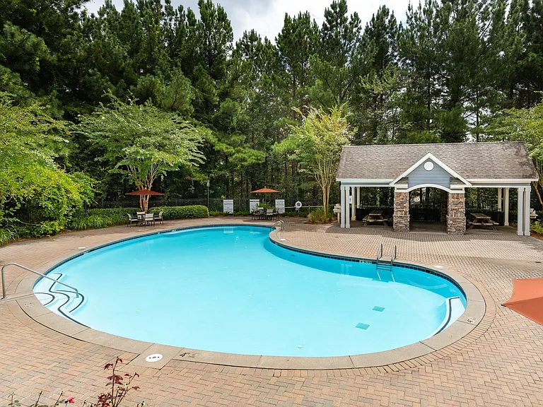 Swimming pool and poolside grilling pavilion
