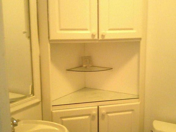 Top Floor ; 4th Floor ; Bathroom ; Pedestal Sink ; Custom Cabinetry.