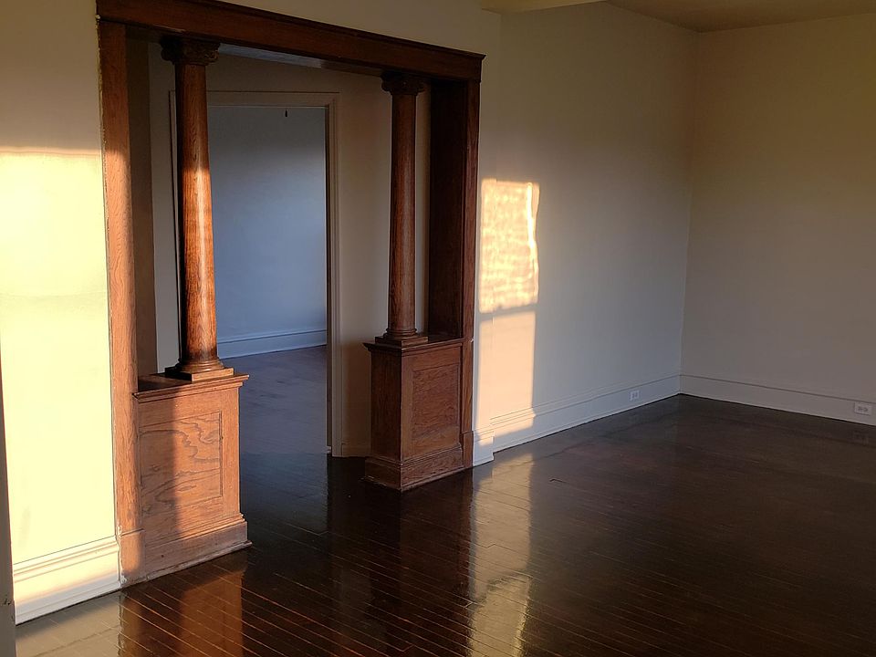 Livingroom walking into hallway, off to the right is the 1st bedroom entrance
