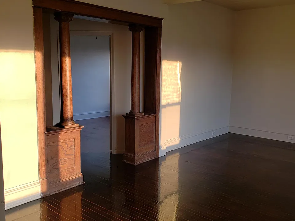 Livingroom walking into hallway, off to the right is the 1st bedroom entrance