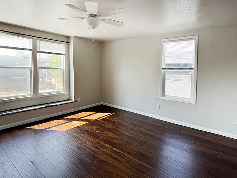 Upstairs Living room with abundant light and street view.