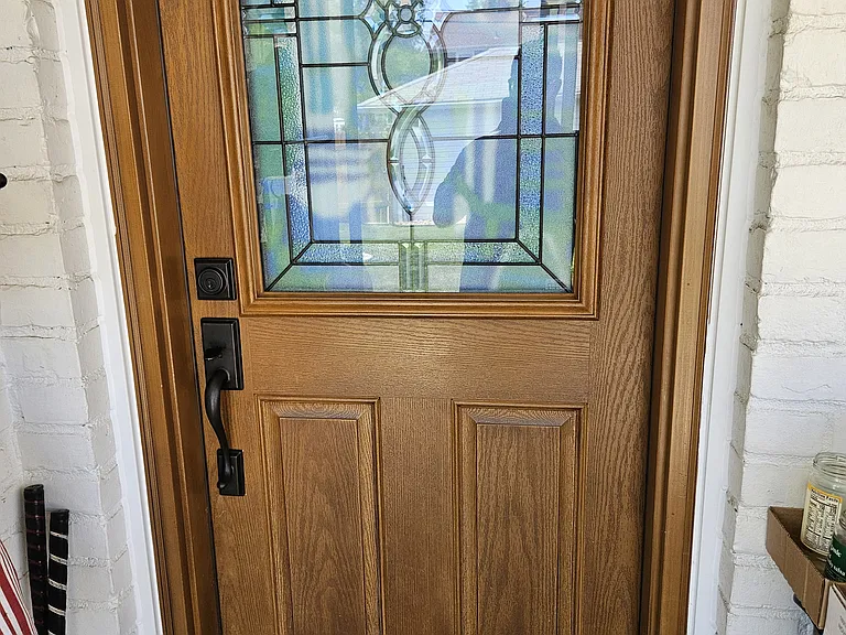 Custom Rear Door off of Enclosed Porch.