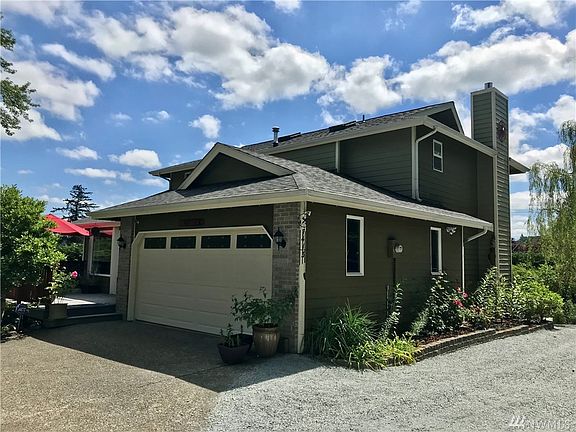 Beautiful home with quality thru-out! Lovely front deck and side landscape! Extensive parking for all outdoor toys! Come look today!