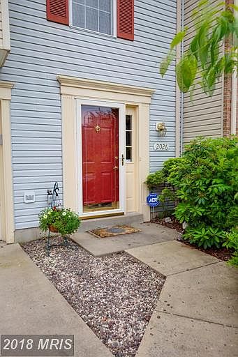 Charming Entry with mature landscaping