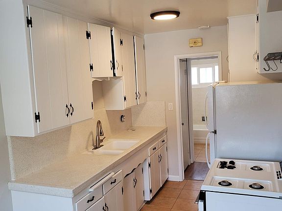 Kitchen size is same layout as this one, but with no door opening at end.
