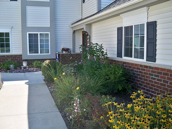 walk along side the garden to your front door