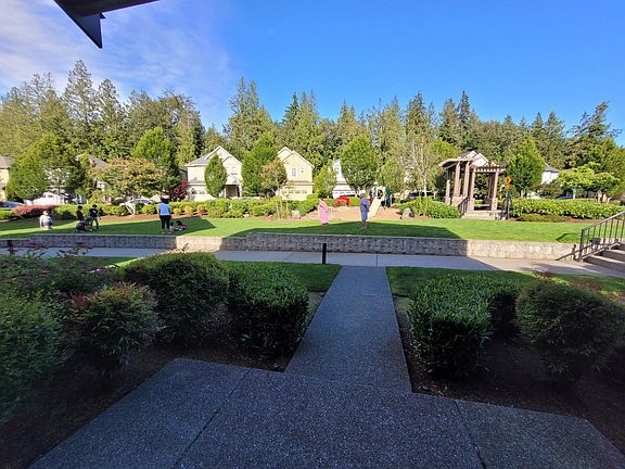 Front door of the house faces east where there is a nice grassy area for kids to hang out