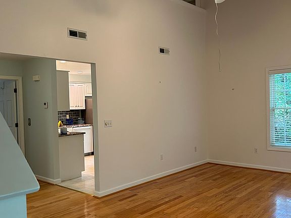 Living area with picture of upstairs loft.