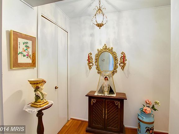 Foyer with wood floors.