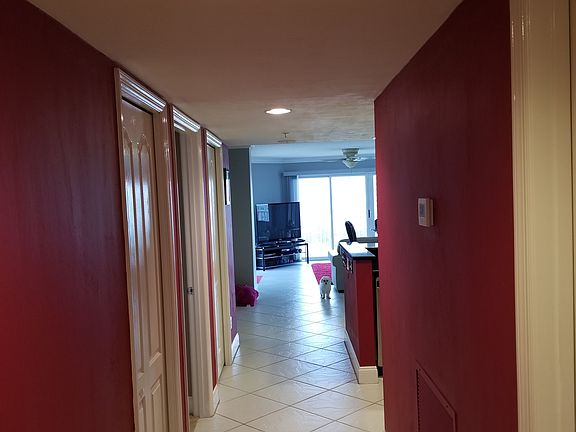 Entrance, laundry to right.