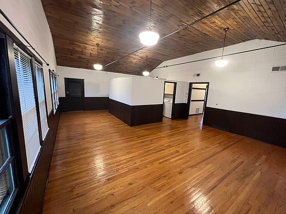 Living and Dining areas ( kitchen behind the half wall)