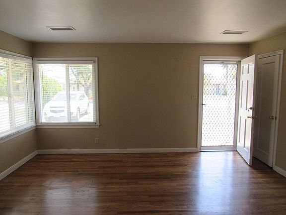 Family Room with natural hardwood floors.