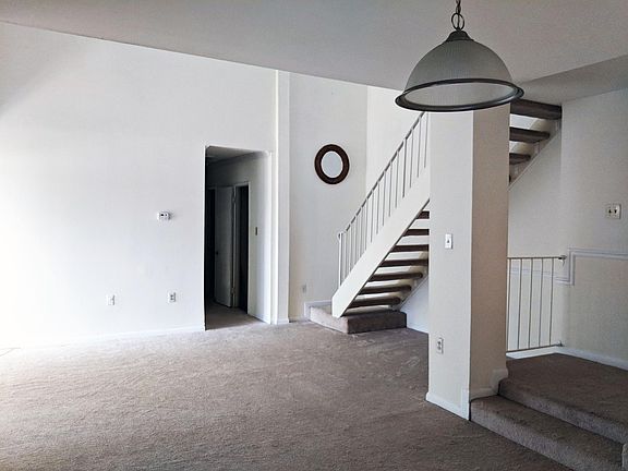Living room and stairs to loft 