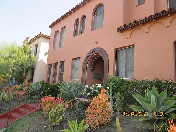 Front view of bldg. The 4 windows on the lower left of entry belong to apartment #102. Sunny Western exposure. Quiet street.