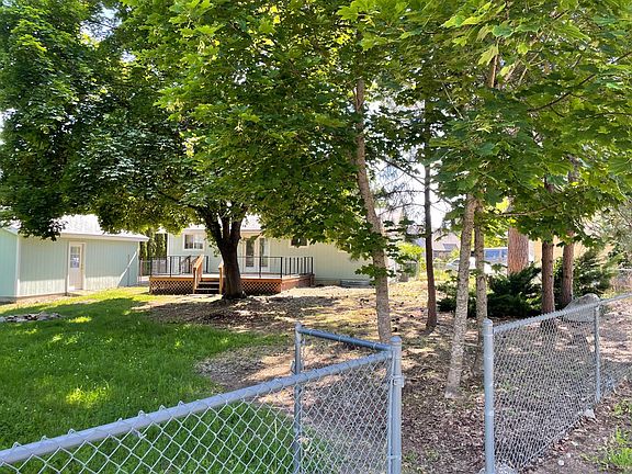 Large fenced back yard with nice deck