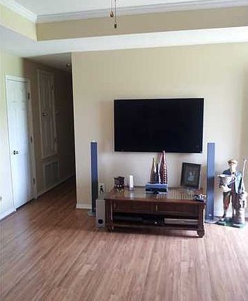 Dining room opens to living and kitchen