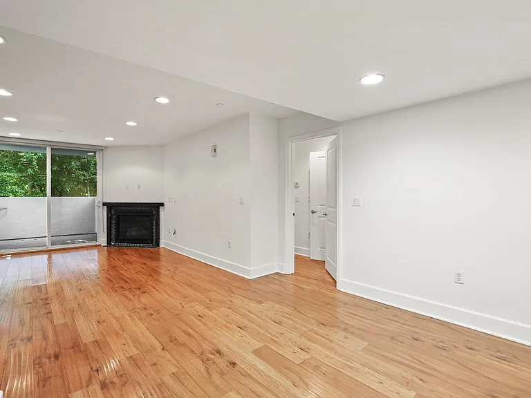 Dining and Living Room Spaces with Access to Patio