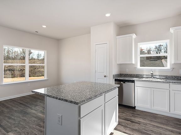 Move freely between the kitchen and the bright dining area