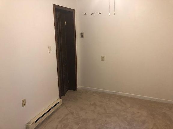 bedroom with fresh paint and new carpet