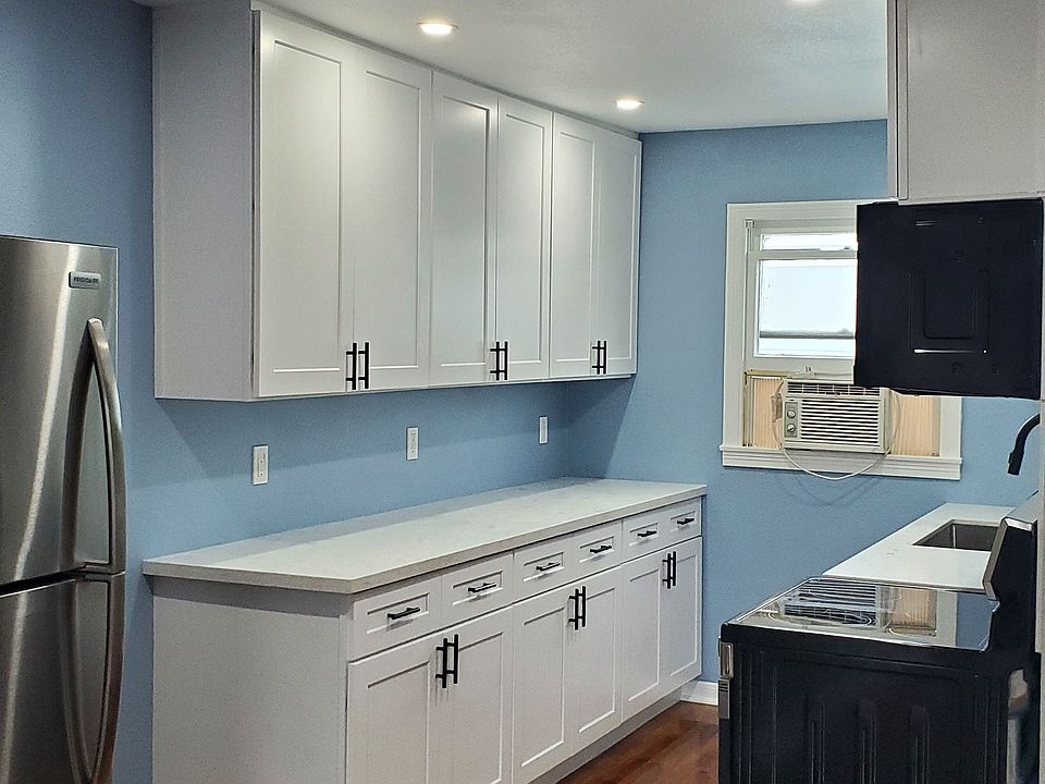 Renovated kitchen with all new appliances including, fridge, oven, microwave, dishwasher, and garbage disposal. Tons of cabinet space!
